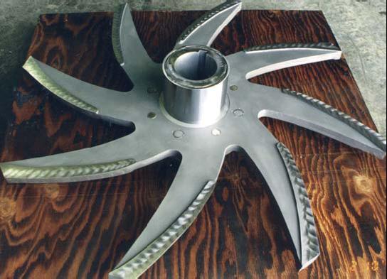 ITEM 1268_TURBO ROTOR AND HUB ASSEMBLY WTH HARDFACING ON LEADING EDGES