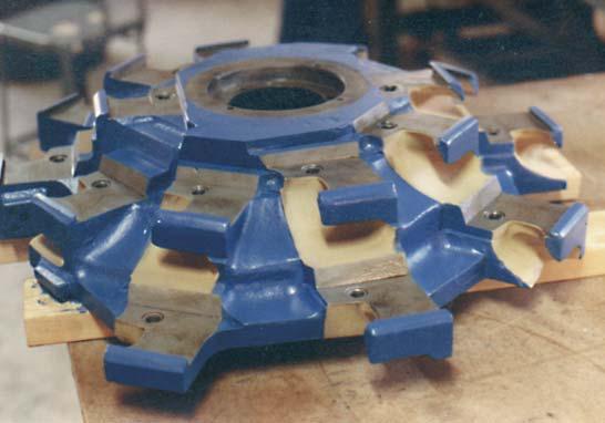 ITEM 1417_SPECIAL CHIPPER WHEEL RESTORED THEN PROTECTED WITH BRONZE COATING PROCESS IN DISCHARGE WEAR AREAS