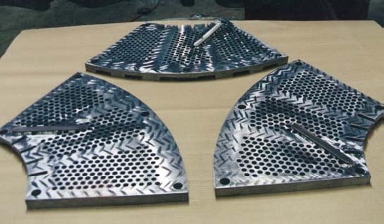RE-MANUFACTURE OF EXTRACTION PLATE SEGMENTS CNC MILLING AND DRILLING